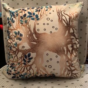 Set of two earth tone/style pillow cases with pillows included.